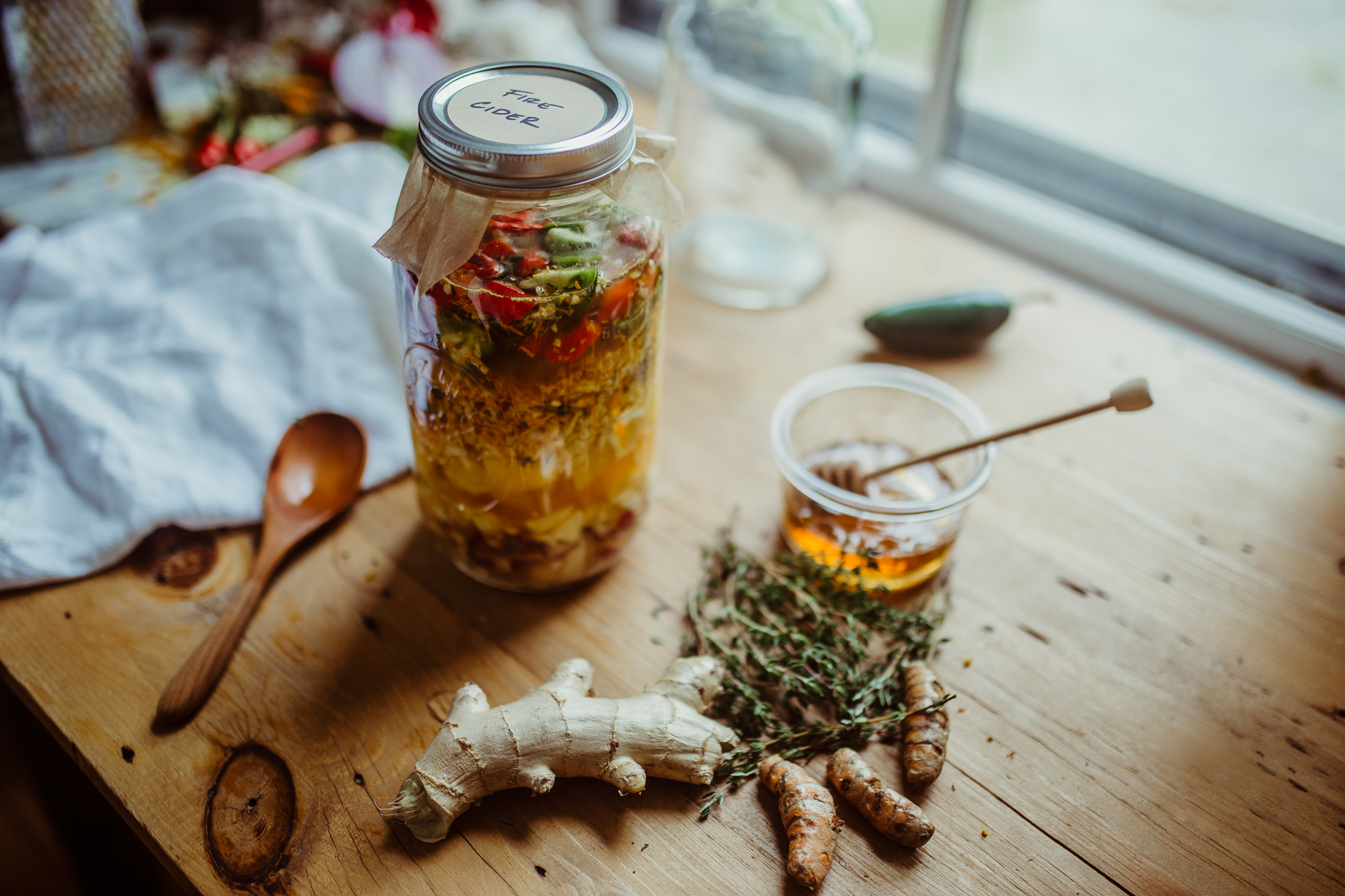 How To Make Homemade Fire Cider | Herbal Academy | 'Tis the season to make homemade fire cider! A shot glass of this a day is a great defense against colds and flu, and it also acts as a decongestant!