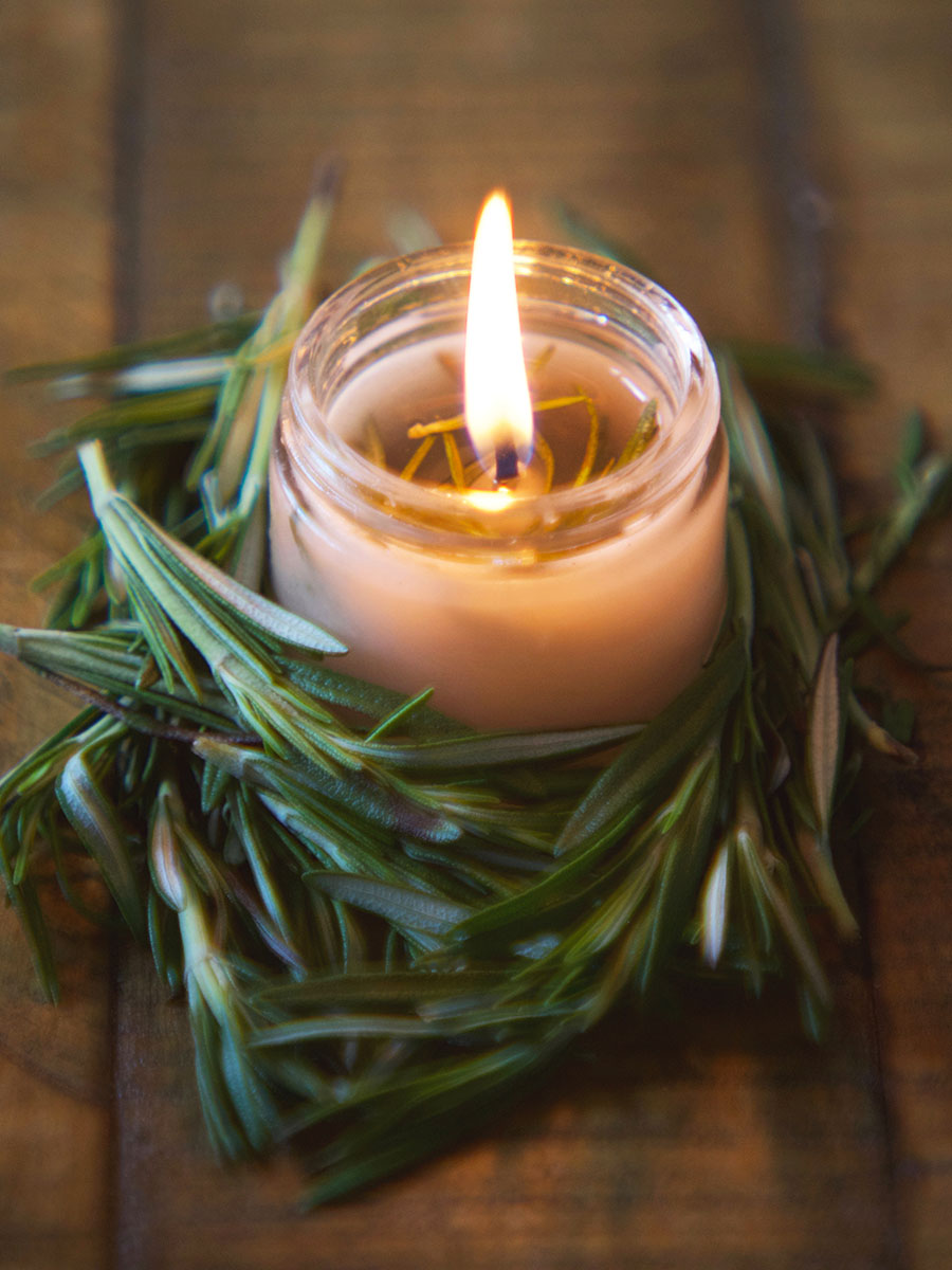DIY Hand Poured Herbal Candles | Herbal Academy | Are you looking for a simple way to enjoy the ambiance of candlelight without all the chemicals? Try making your own hand poured herbal candles instead!