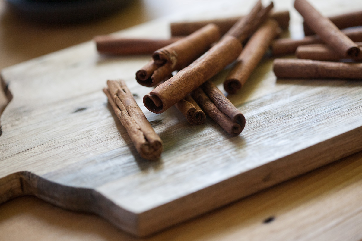 cinnamon sticks on a cutting board