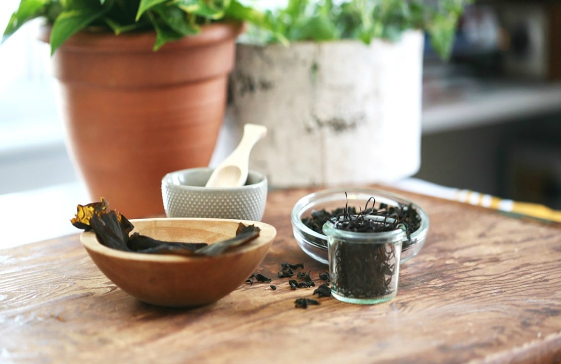 dried seaweed in bowls on a table