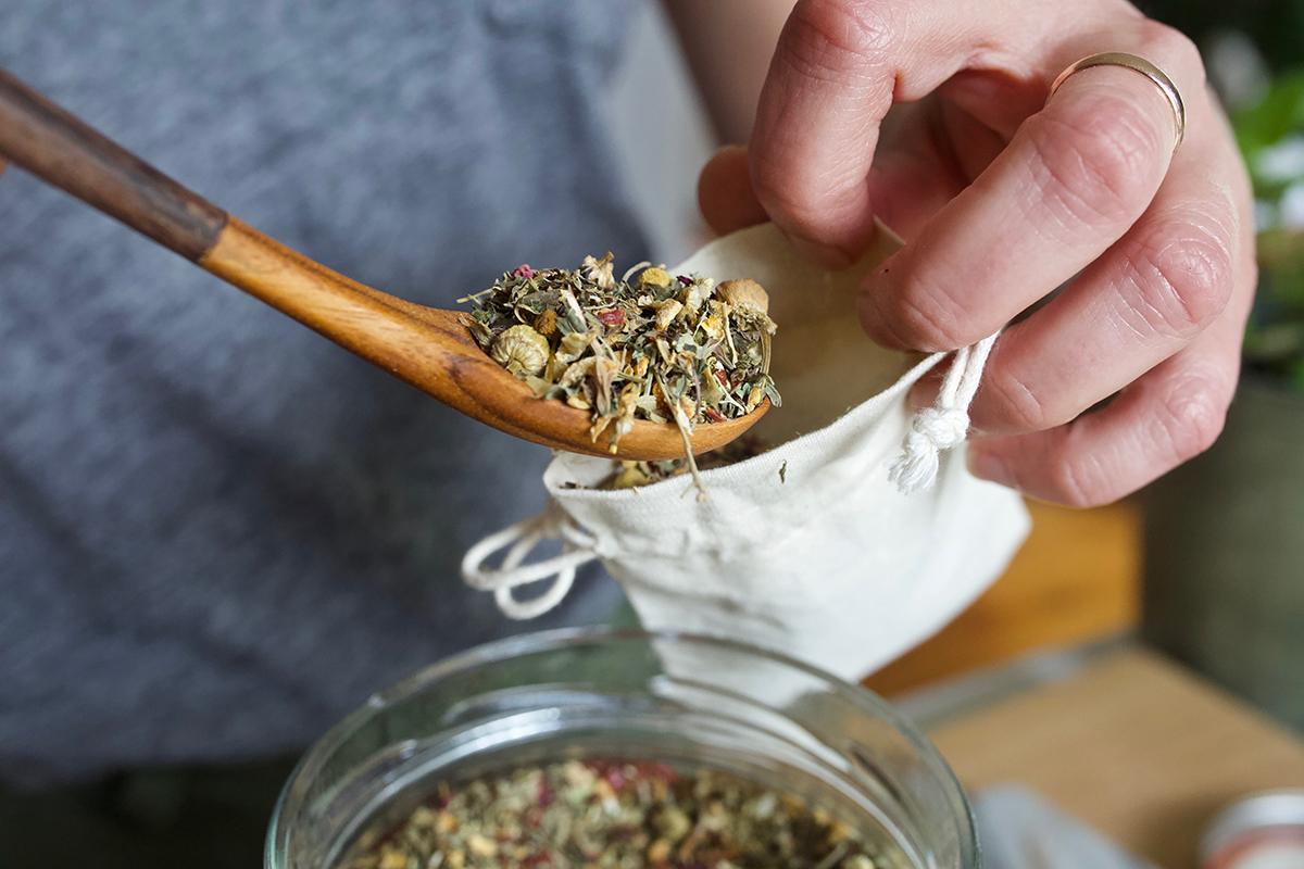 How To Make A Summer Garden Bath Tea | Herbal Academy | A summer garden bath tea is a great way to unwind. Here are our top five herbs to include plus tips for planting, growing, and harvesting these herbs too!