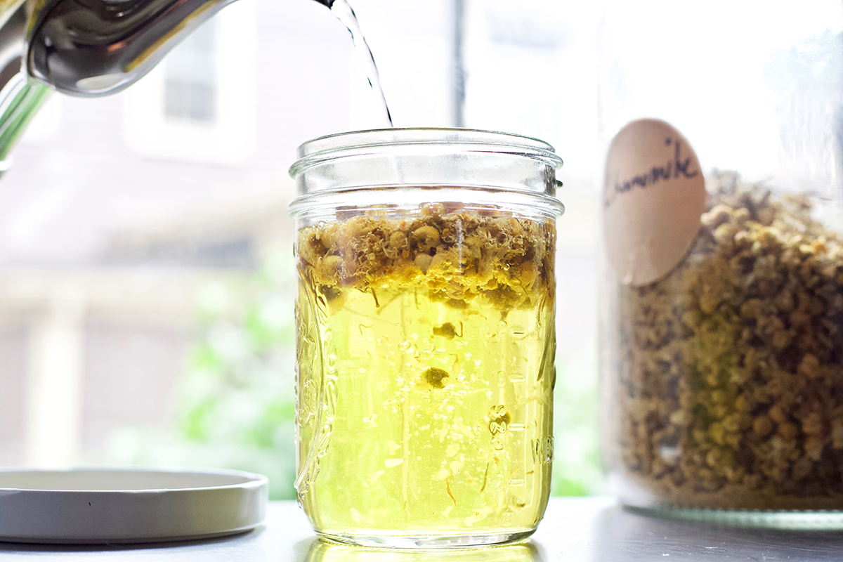 making chamomile tea