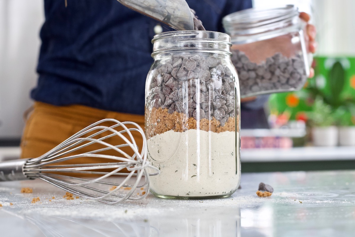 mason jar of layered ingredients for cookies