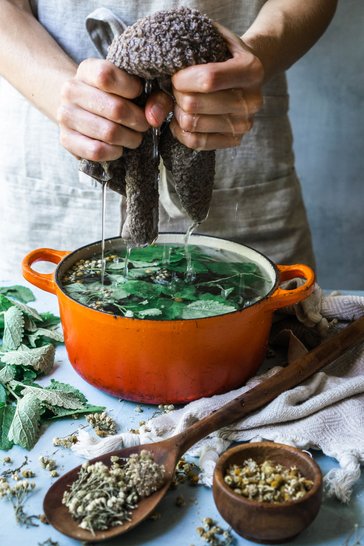 Try A Cooling Herbal Compress for Hot Summer Days | Herbal Academy | One way to keep the heat at bay while enjoying summer weather is to make a cooling herbal compress from herbs like peppermint, yarrow, and chamomile.
