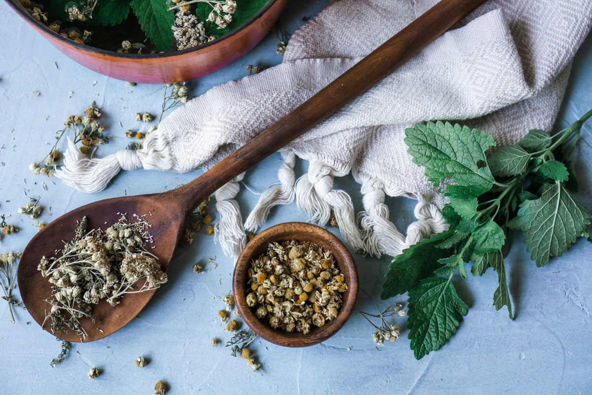 Try A Cooling Herbal Compress for Hot Summer Days | Herbal Academy | One way to keep the heat at bay while enjoying summer weather is to make a cooling herbal compress from herbs like peppermint, yarrow, and chamomile.