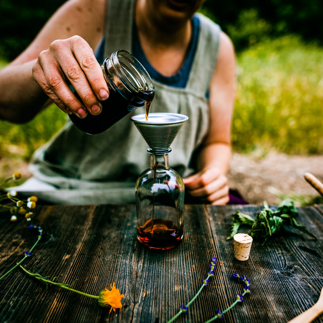 Colleen Codekas making herbal syrups