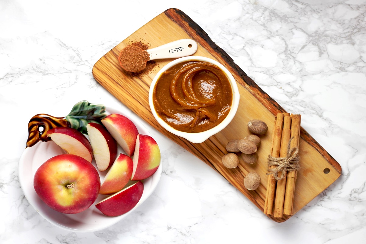 Healthy caramel apples on a cutting board