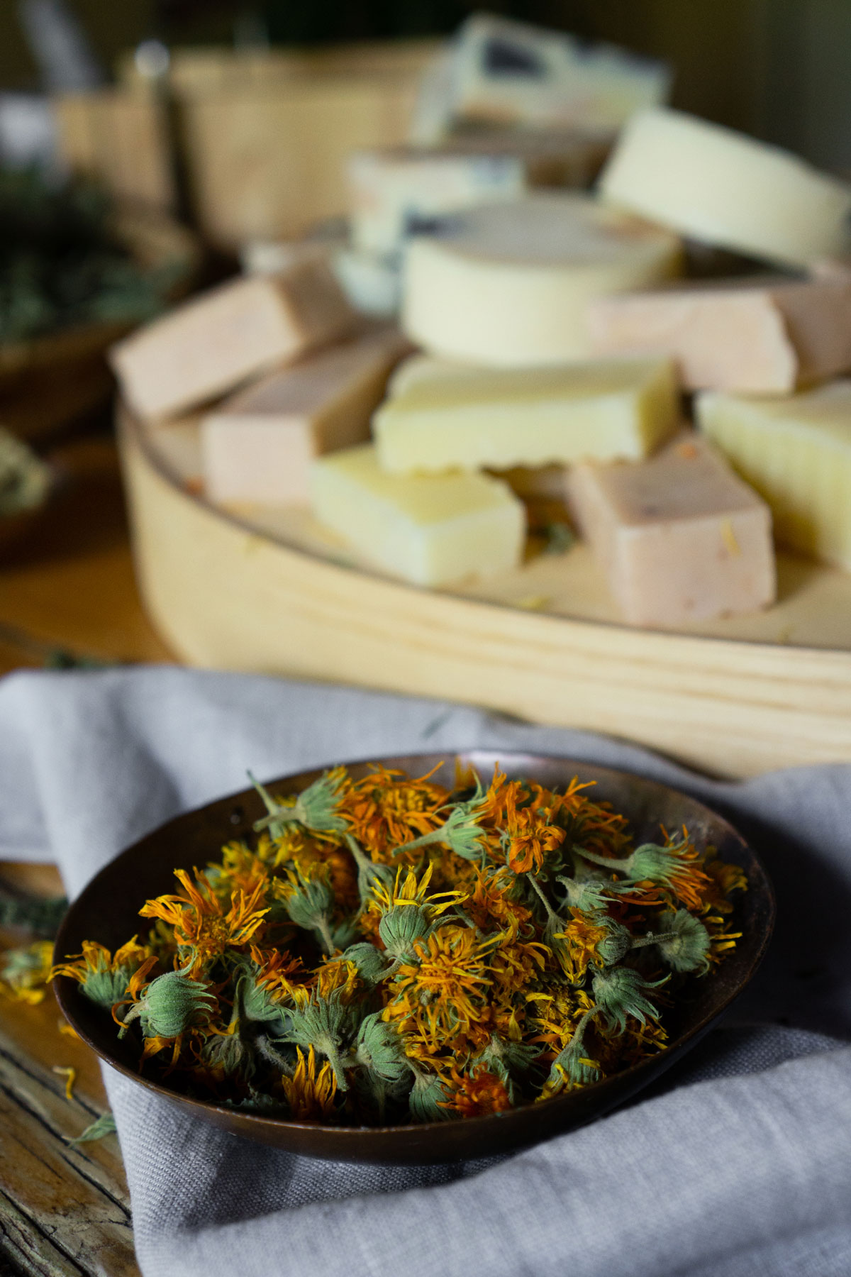 Calendula and homemade soap on a table