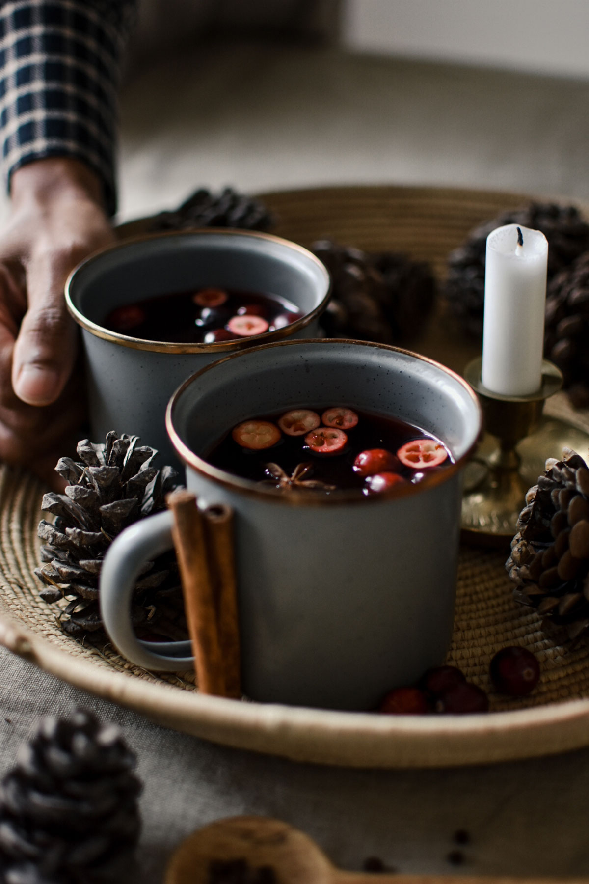 cranberry hot toddies in white mugs