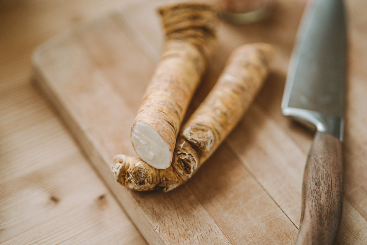 Horseradish root on a cutting board