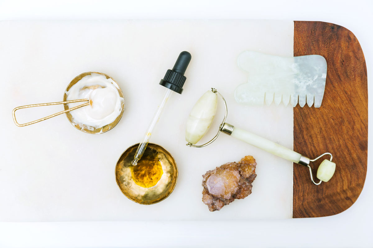 Tray of herbal skincare products by Katie Woods of Ritual Skincare