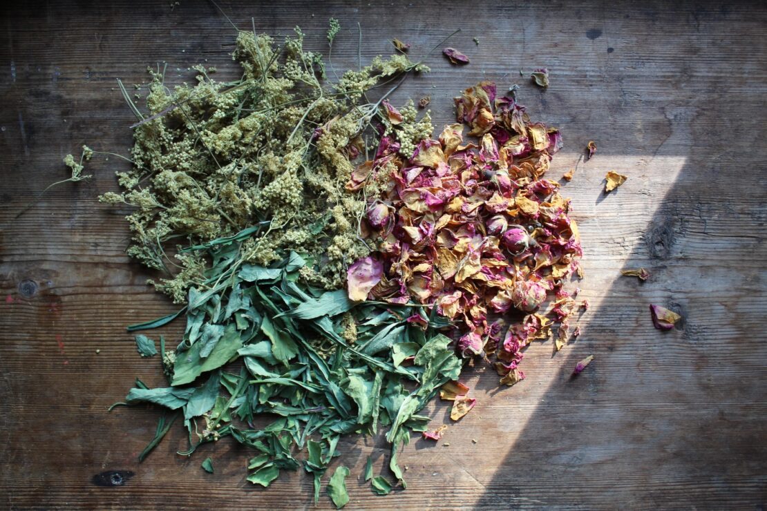 Meadowsweet Tea with Rose | Herbal Academy | dried herbs on wood board