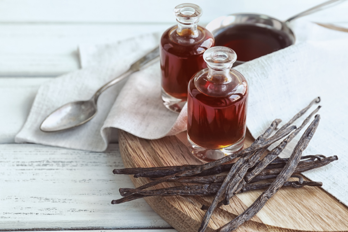 Homemade Vanilla Extract | Herbal Academy | vanilla pods on table with jars