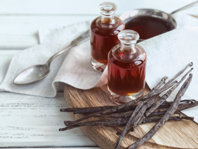 Homemade Vanilla Extract | Herbal Academy | vanilla pods on table with jars