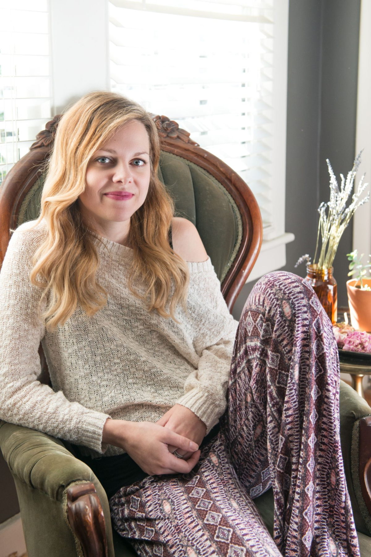 Chelsea Stephens sitting in a chair, looking at the camera