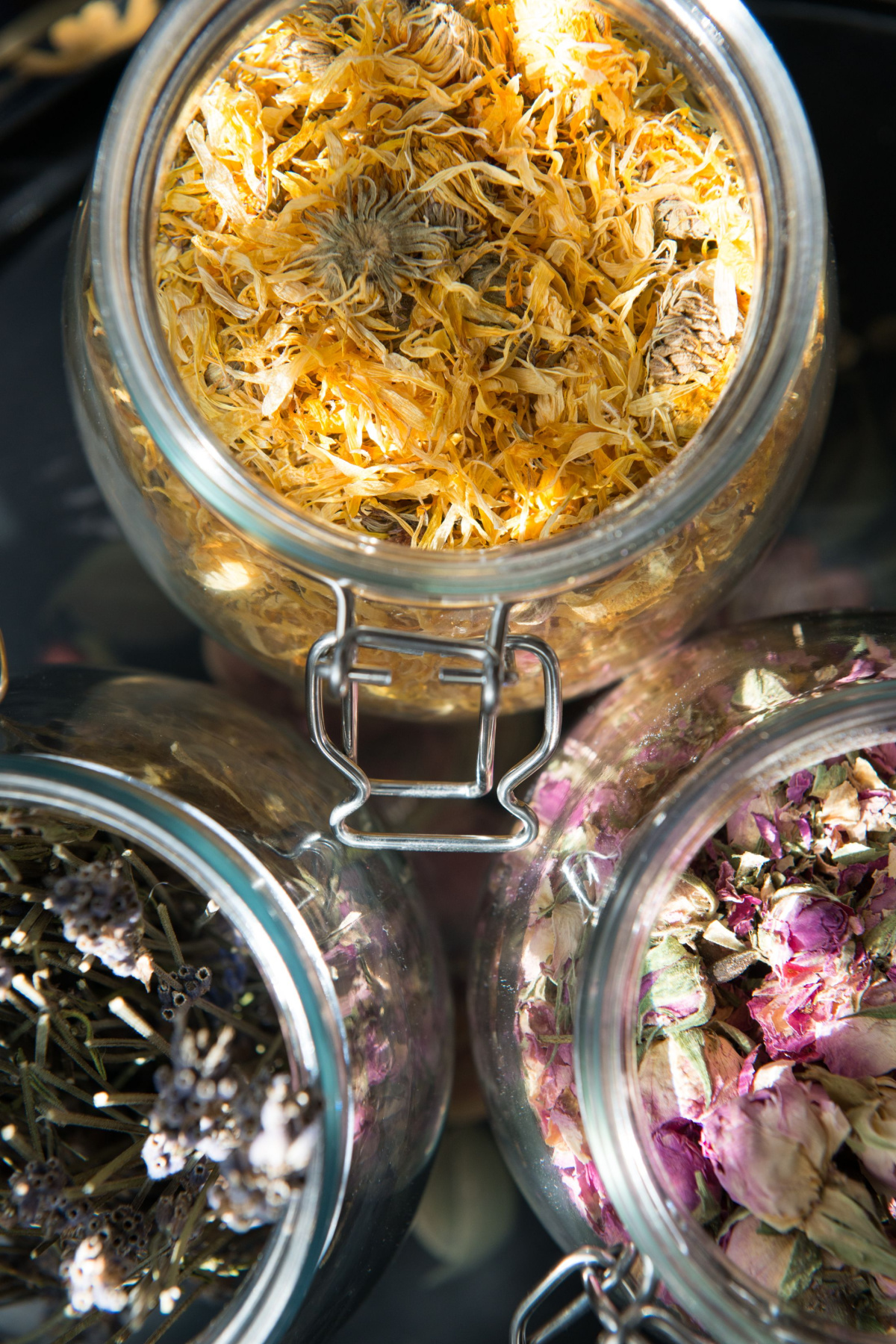 dried herbs in jars