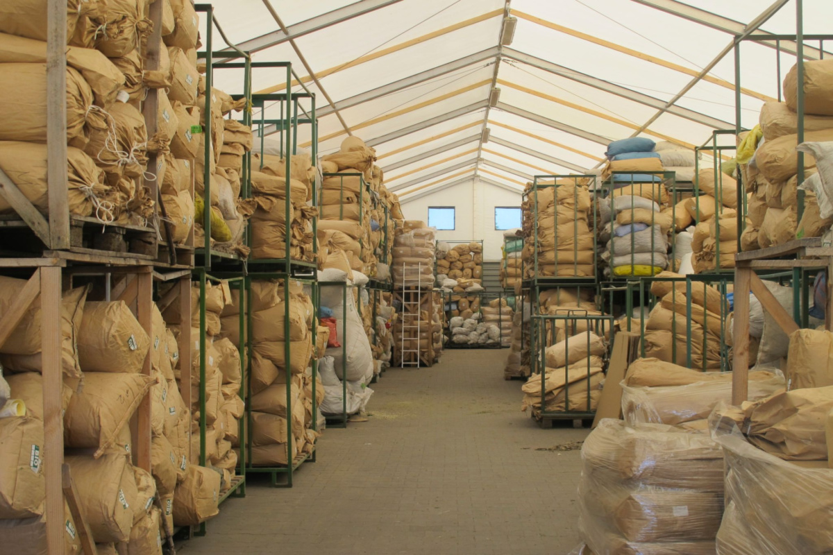 bags of herbs stored on shelves