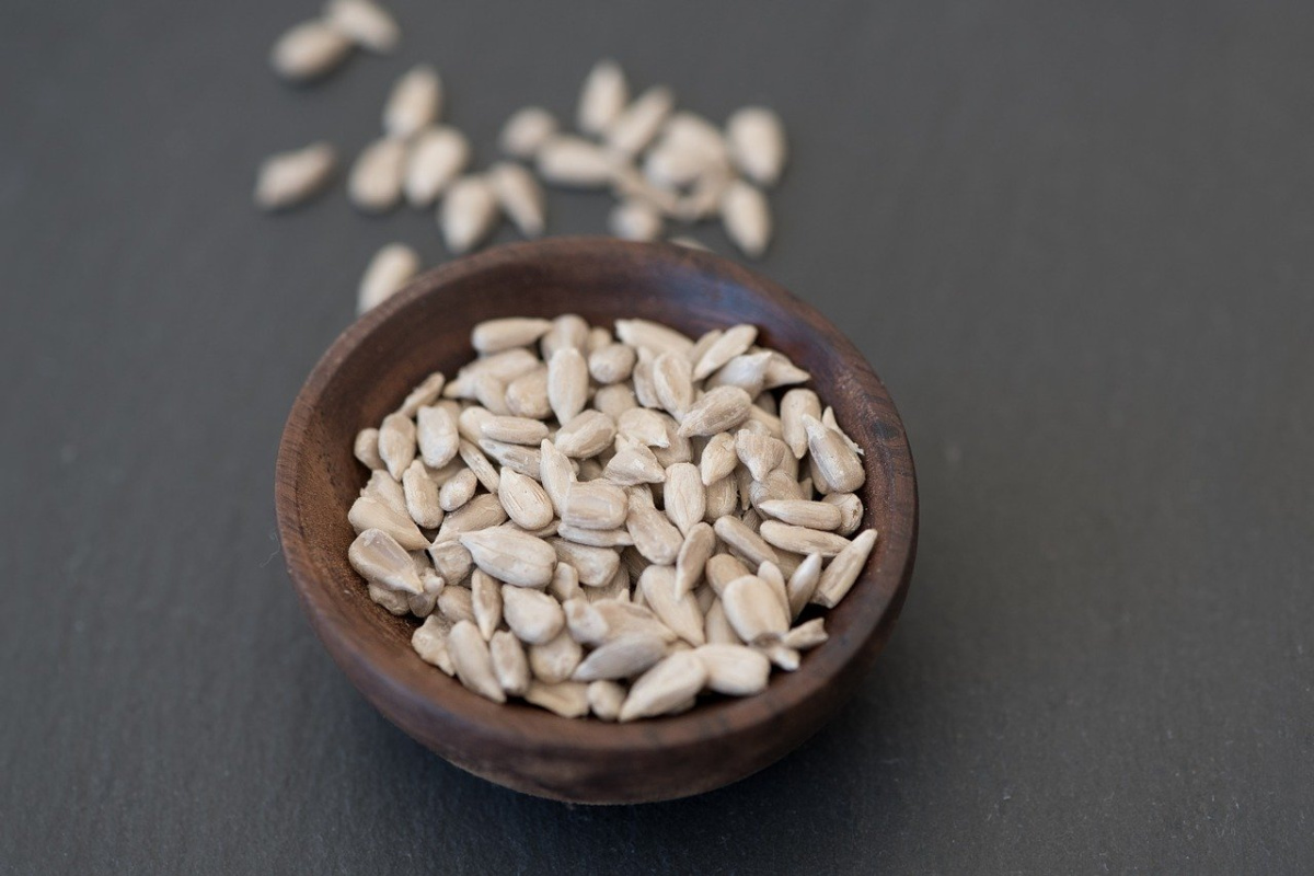 sunflower seeds in a brown bowl 