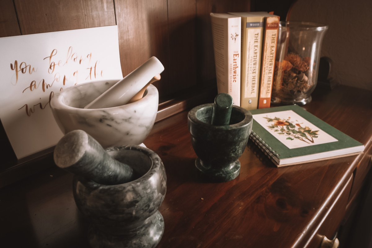 set of mortar and pestles sitting on a table