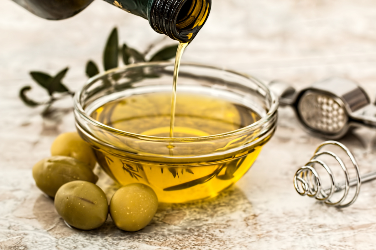 olives, olive oil, and herbs ready for traditional Mediterranean recipes