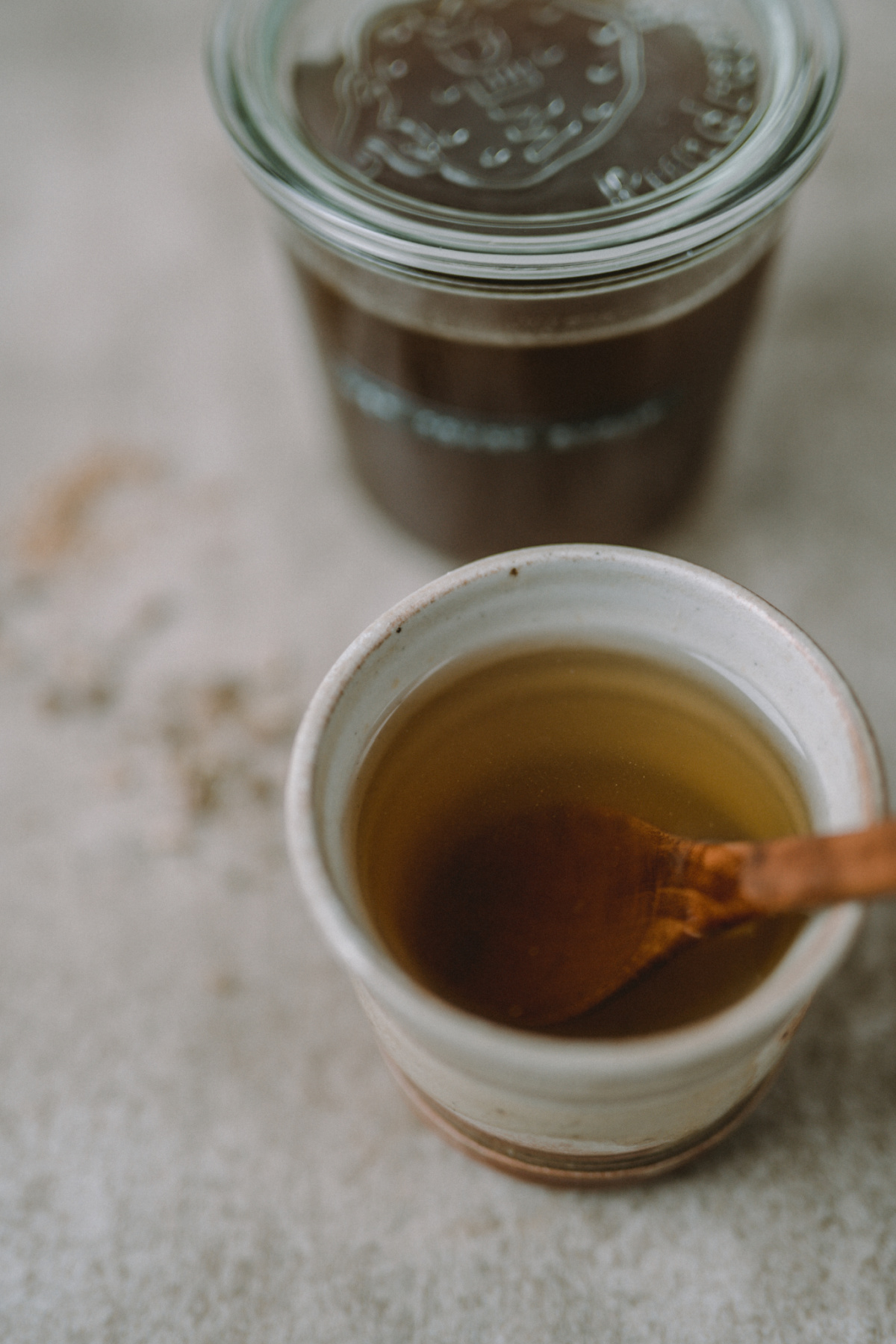 cup of tea with homemade cough syrup