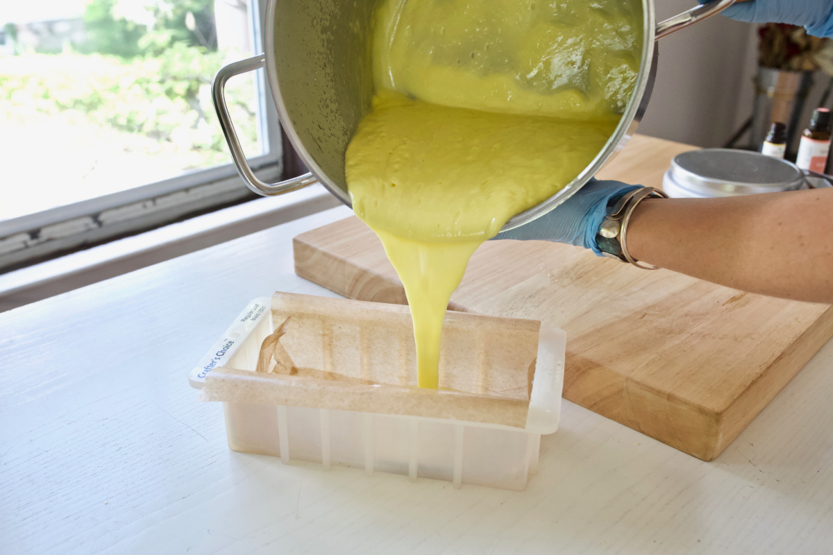 pouring soap into a mold