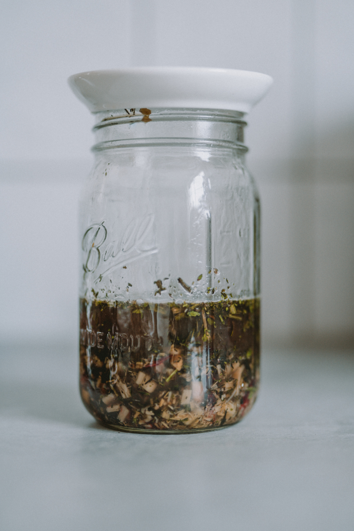 infusing herbs in a jar for cough syrup recipe