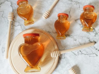 Rose and Vanilla Honey Recipe | Herbal Academy | This simple rose and vanilla honey is a wonderful gift idea for someone you love and is sure to be a hit to the heart.