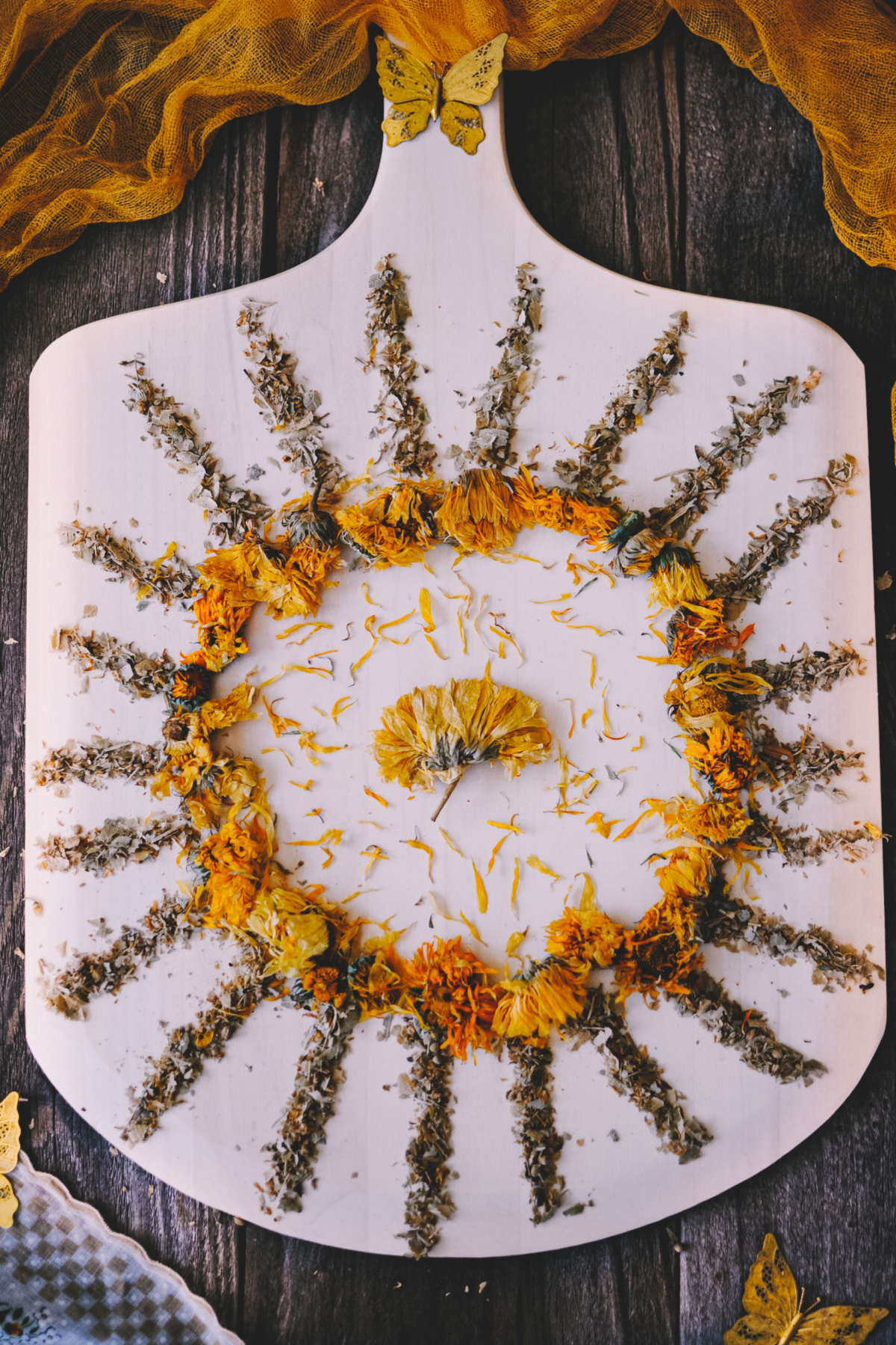 dried herbs in the shape of the sun