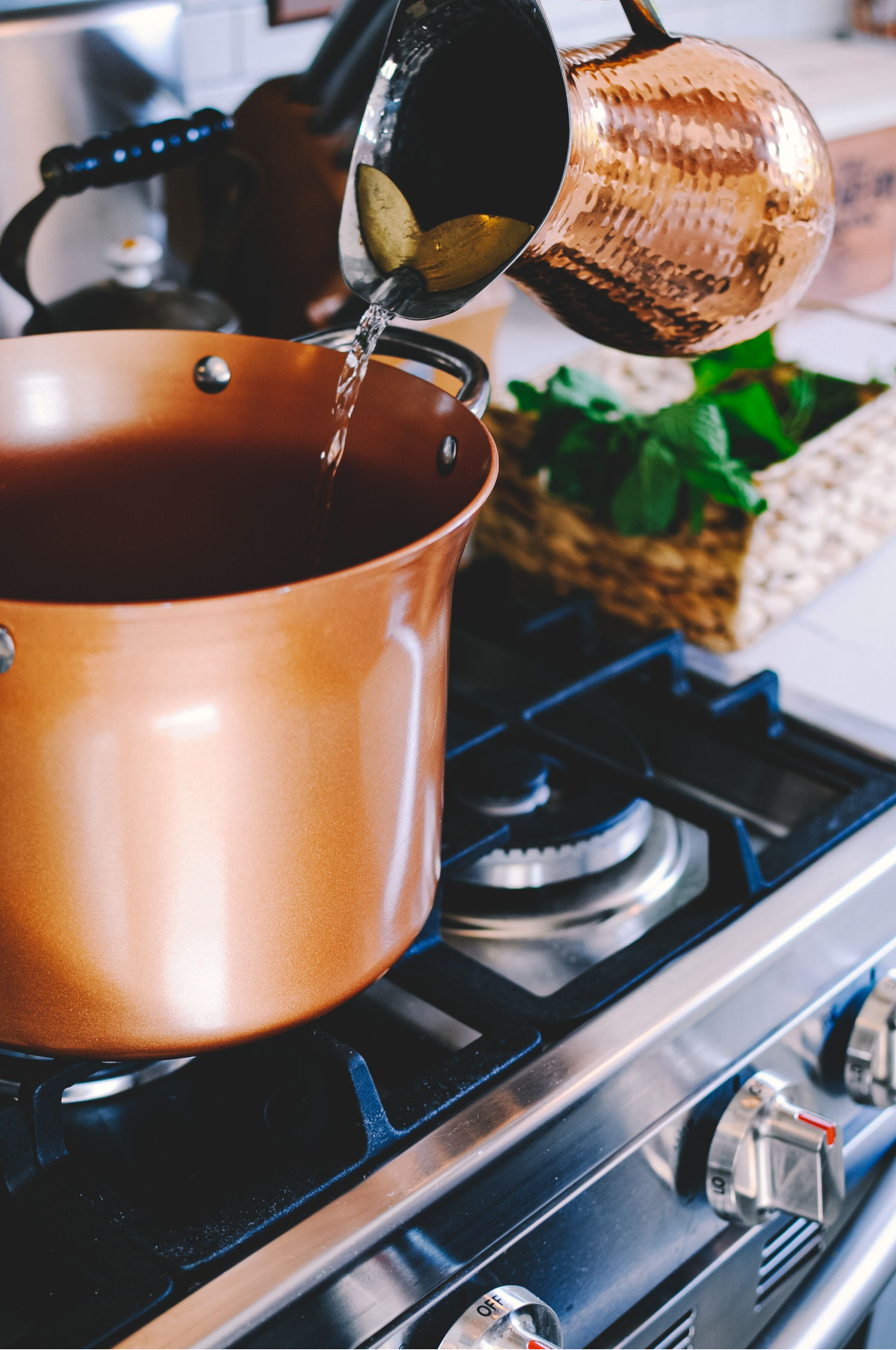 pouring water into a pot