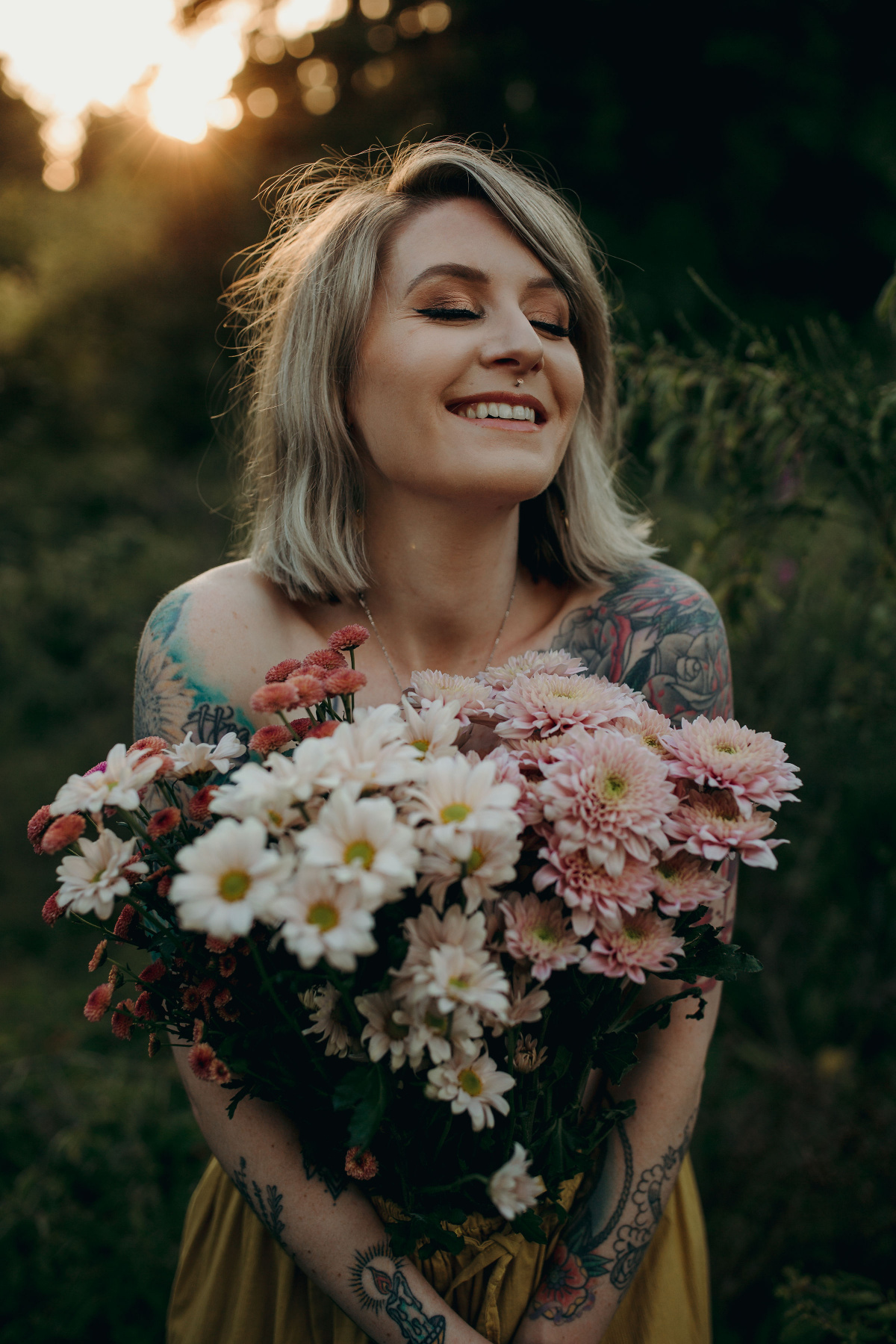 Jess Madsen holding a bouquet of flowers