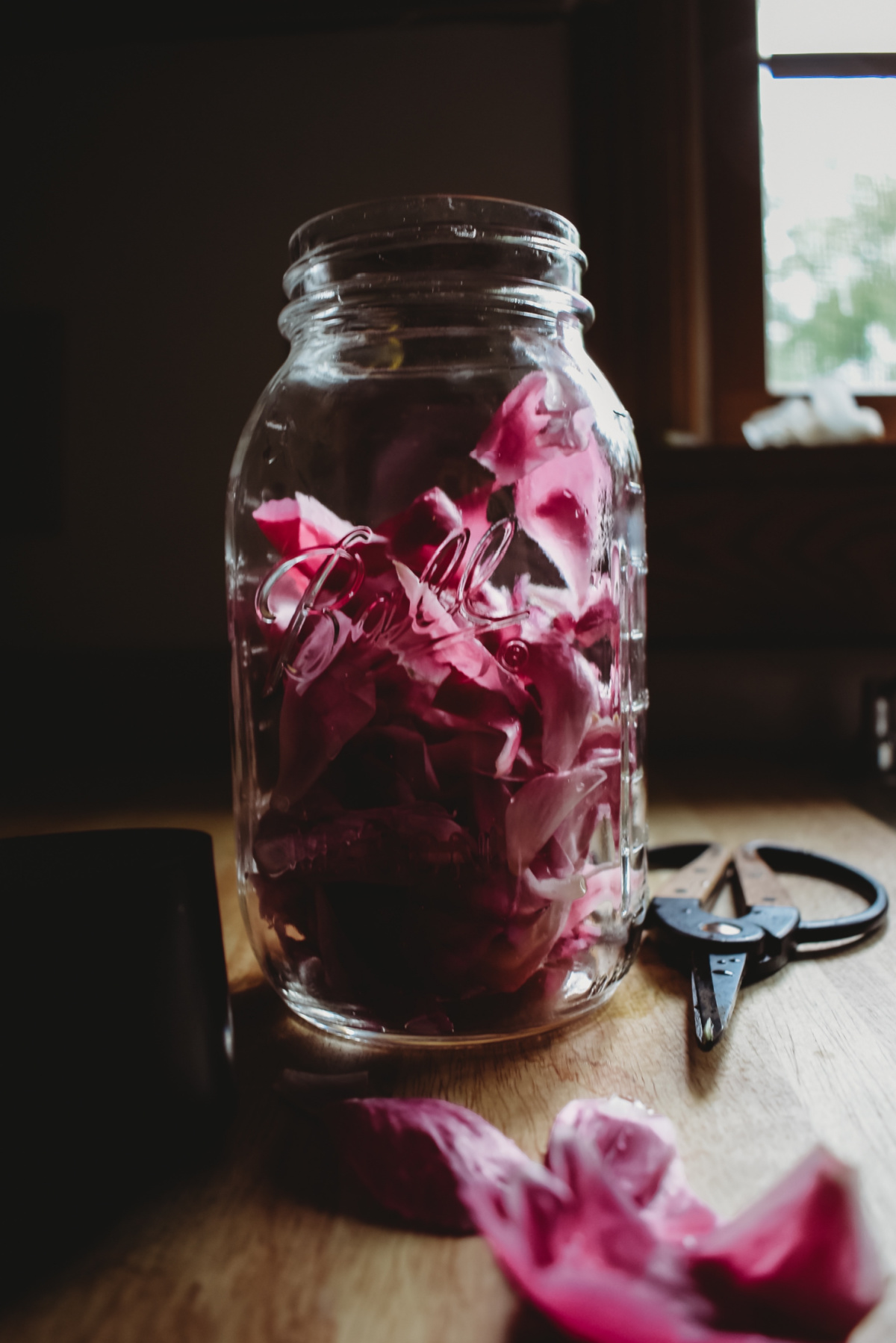 peony petals in a jar