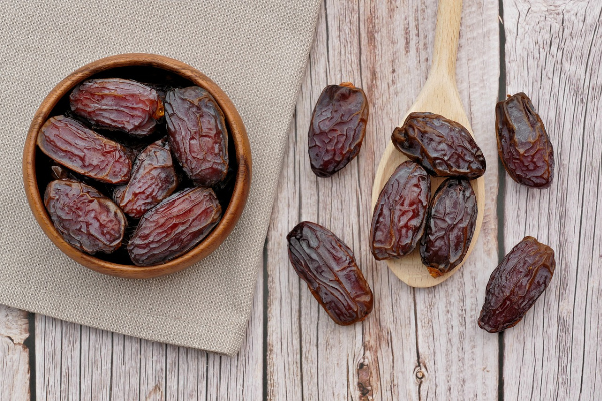 dates in a bowl and on the table