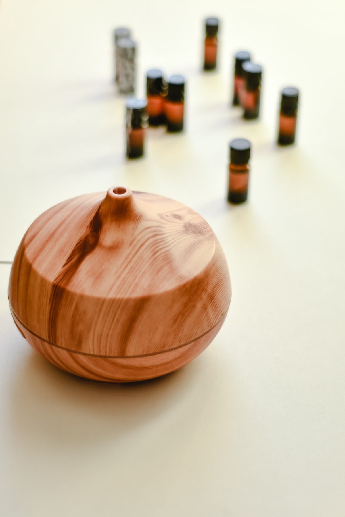 diffuser with essential oils in the background