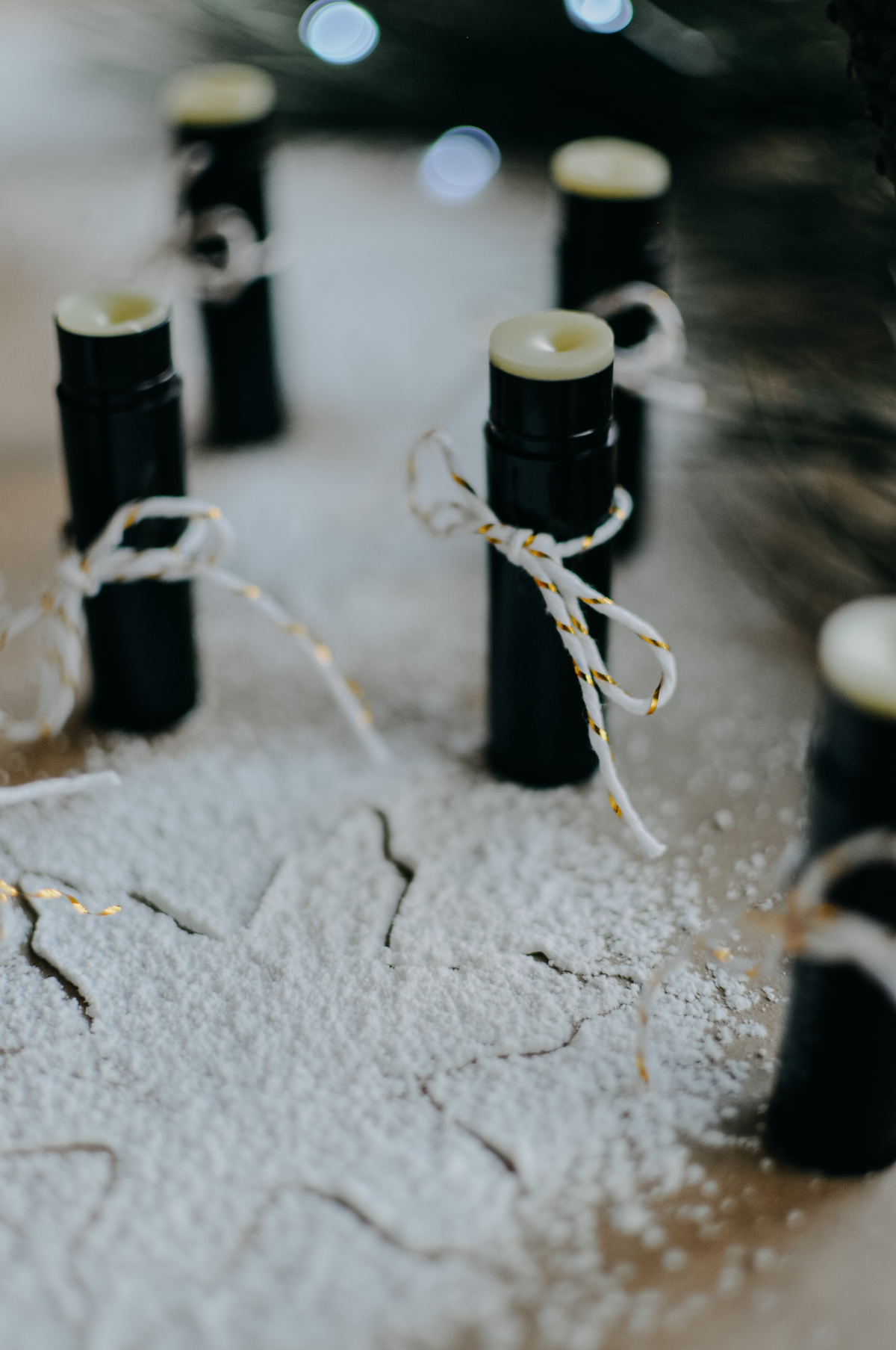 herbal chapstick tubes on a table