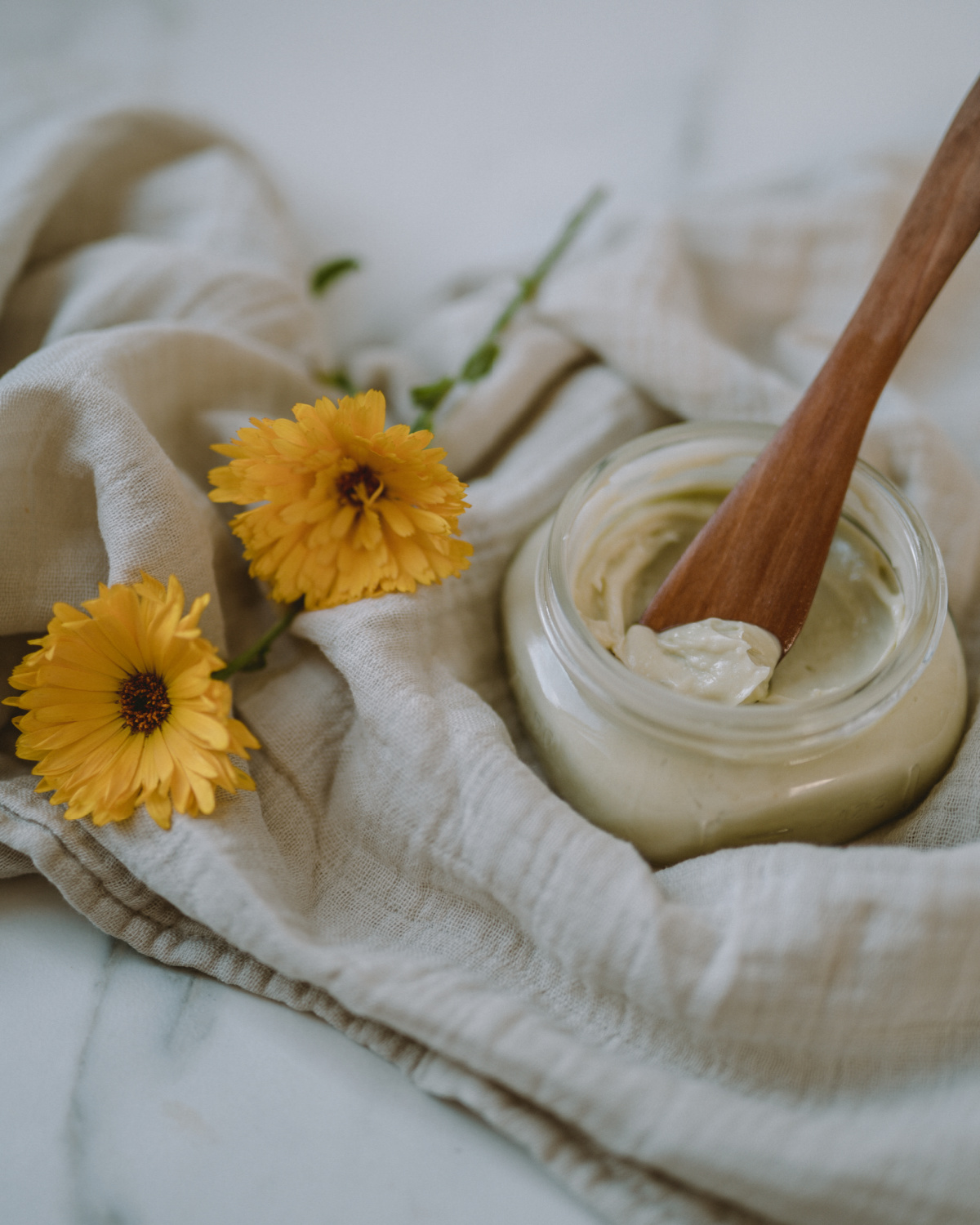 pregnancy belly cream with calendula flowers 
