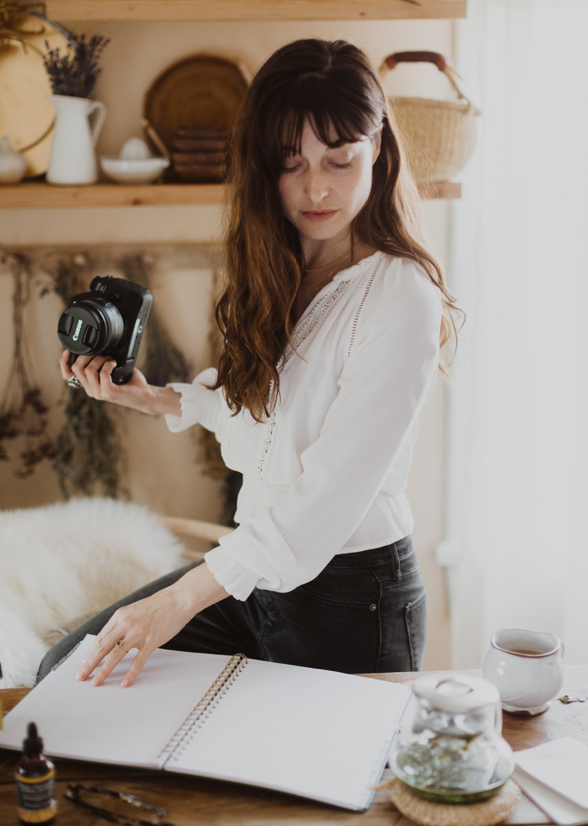 Hannah Lasorsa working for her business, Herbal Content Cottage