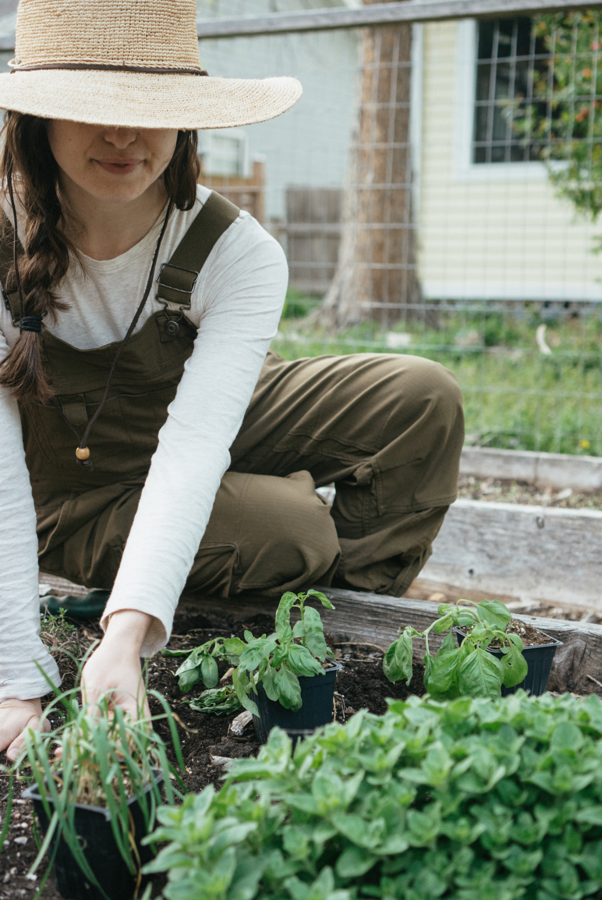 woman moving plants