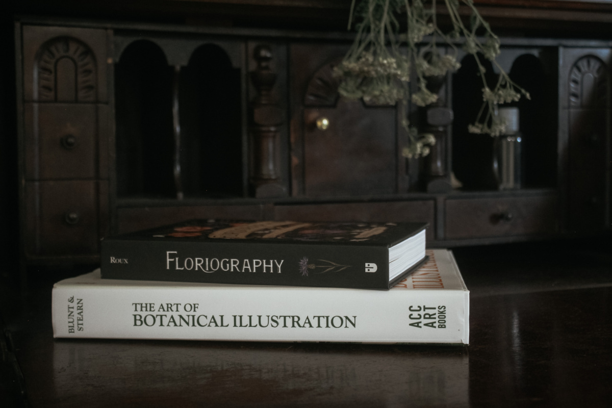 stack of botanical illustration books