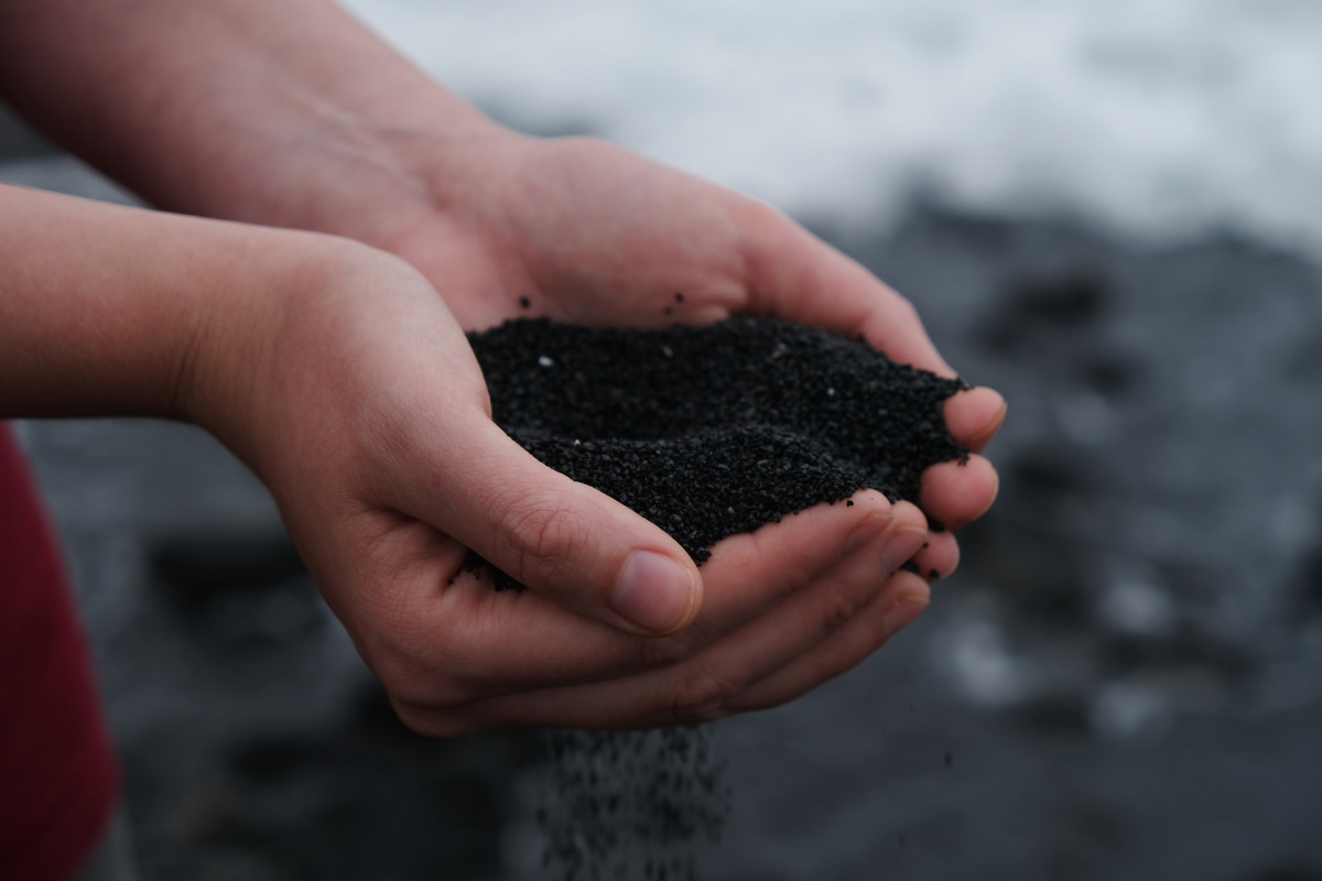 hand holding compost