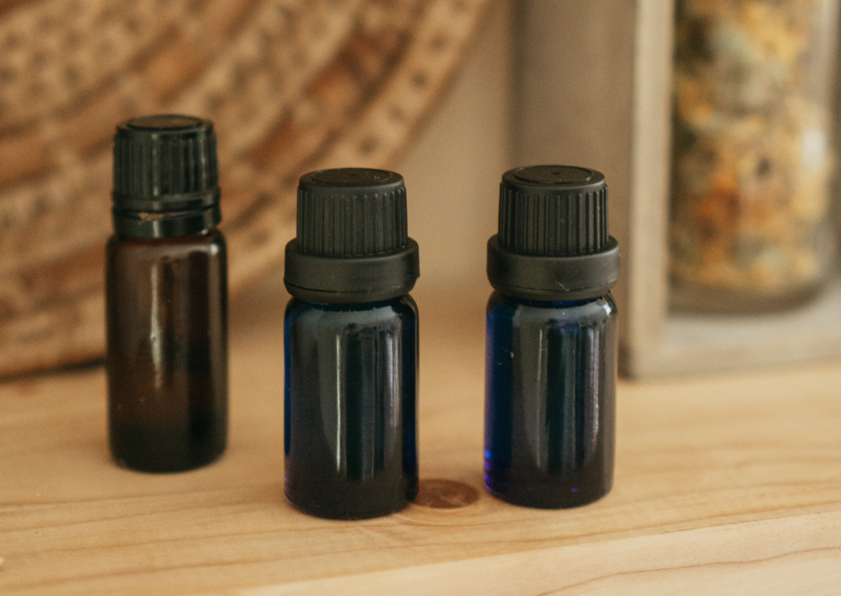 essential oil bottles sitting on a table