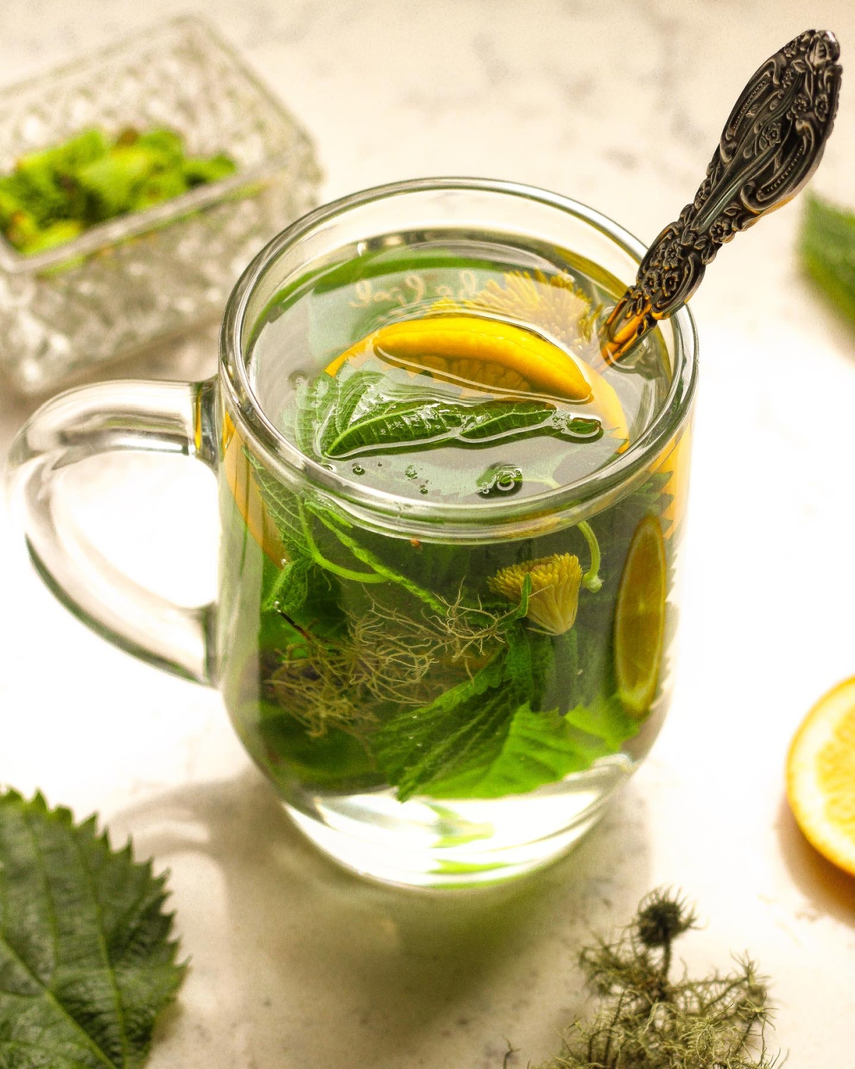 infusing herbs in glass cup