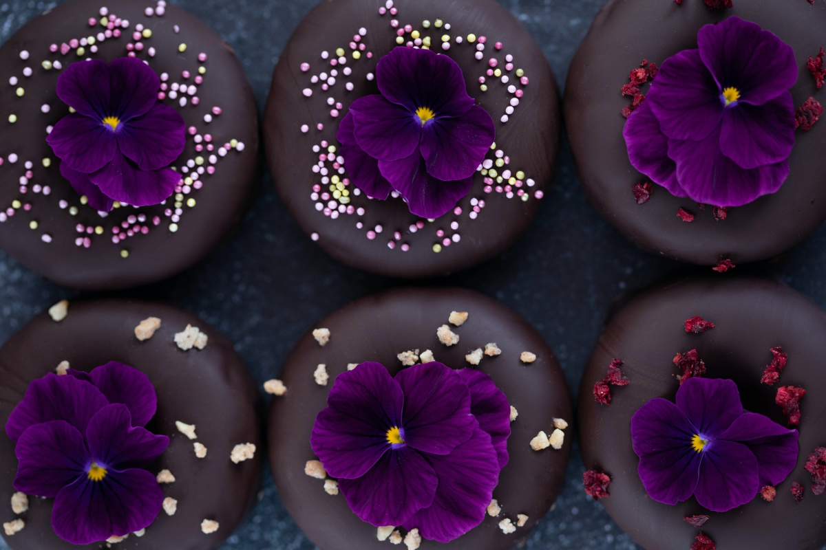 purple flowers on cupcakes