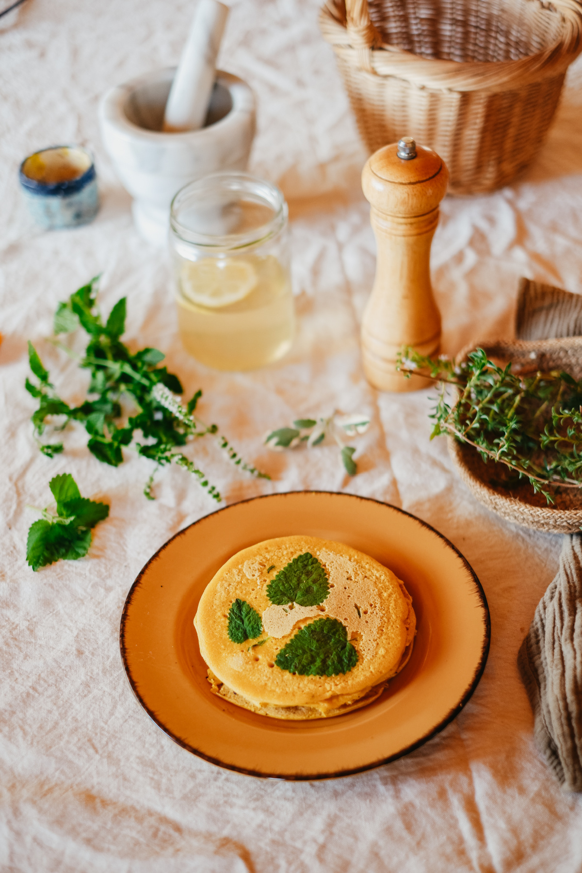 chickpea flour pancakes on a yellow plate