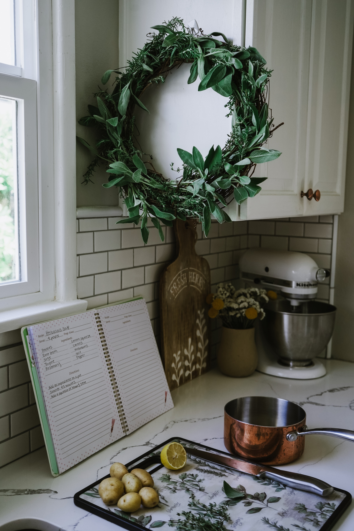 culinary wreath hanging in kitchen