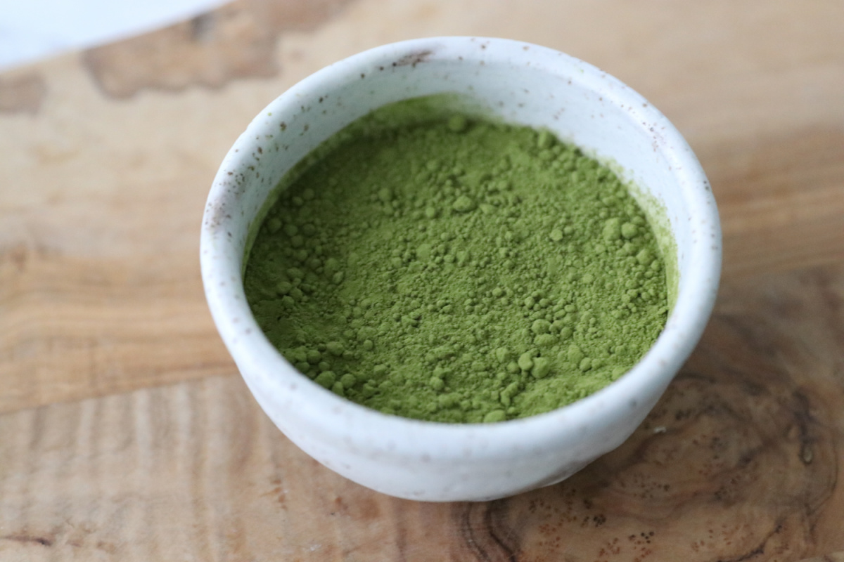 matcha powder in white bowl