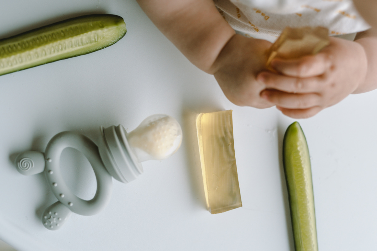 items on baby tray for teething