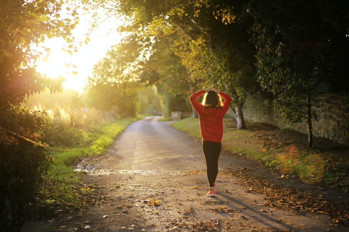 woman walking on road