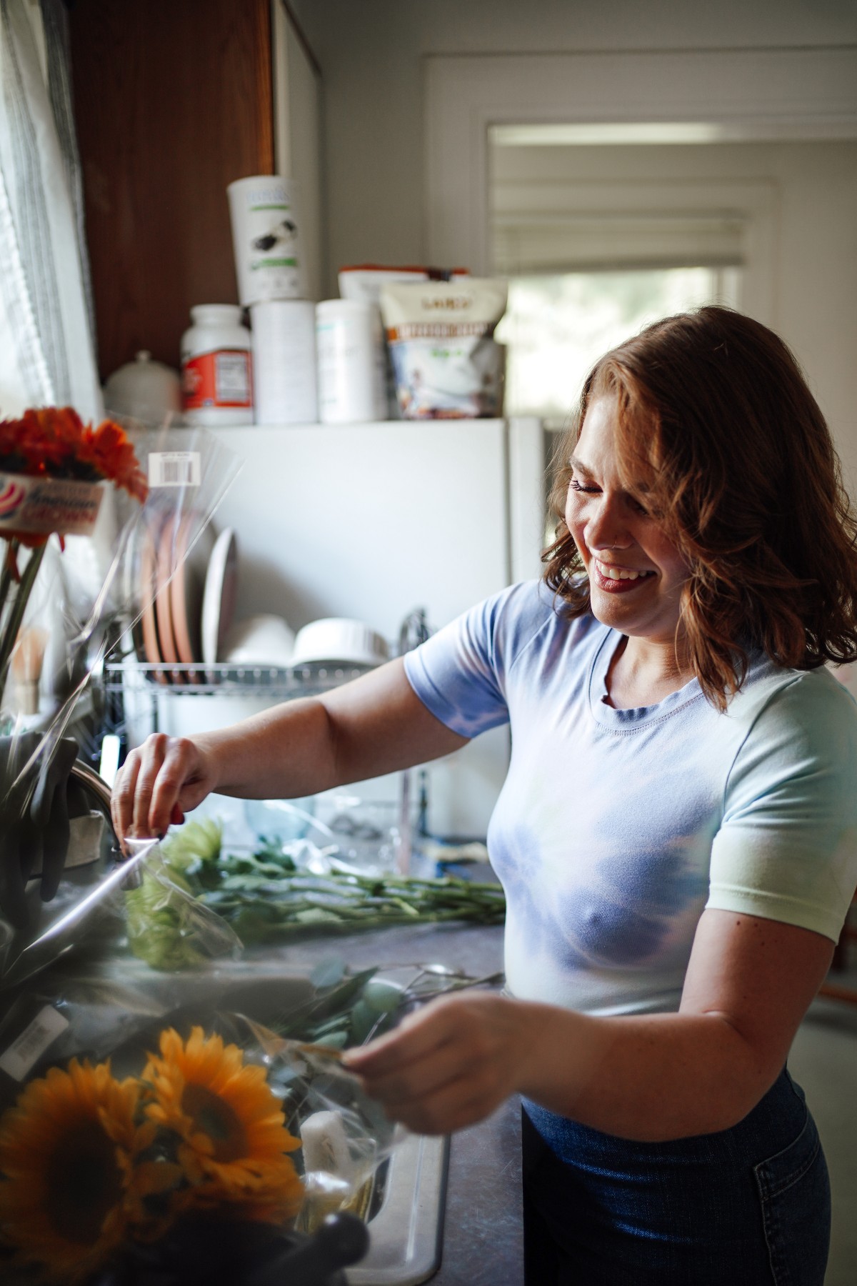 woman arranging flowers