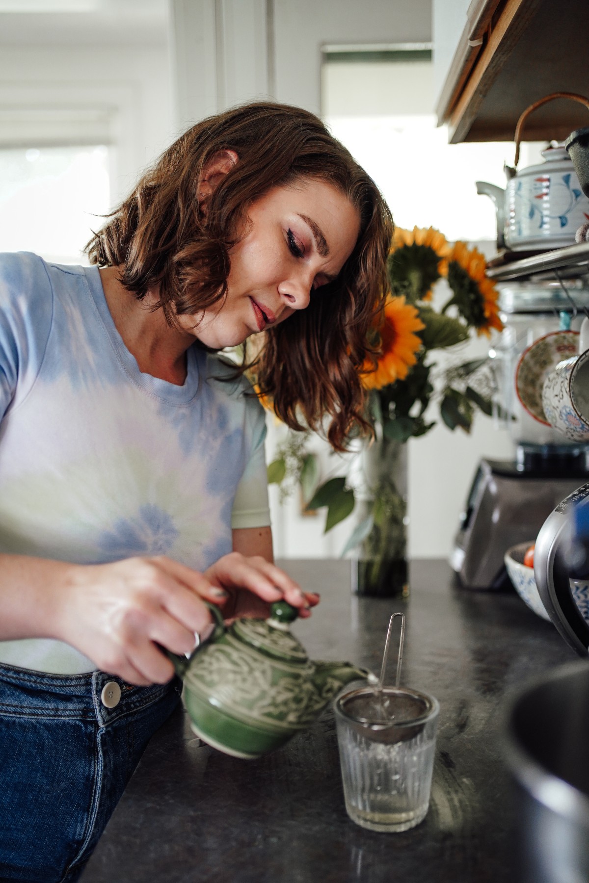 woman pouring tea